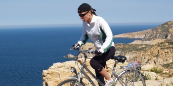 Cycling along the sea on the Cap Corse