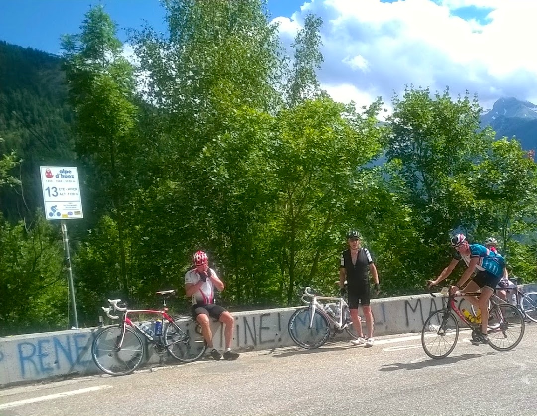 Cyclomundo riders resting at turn 13