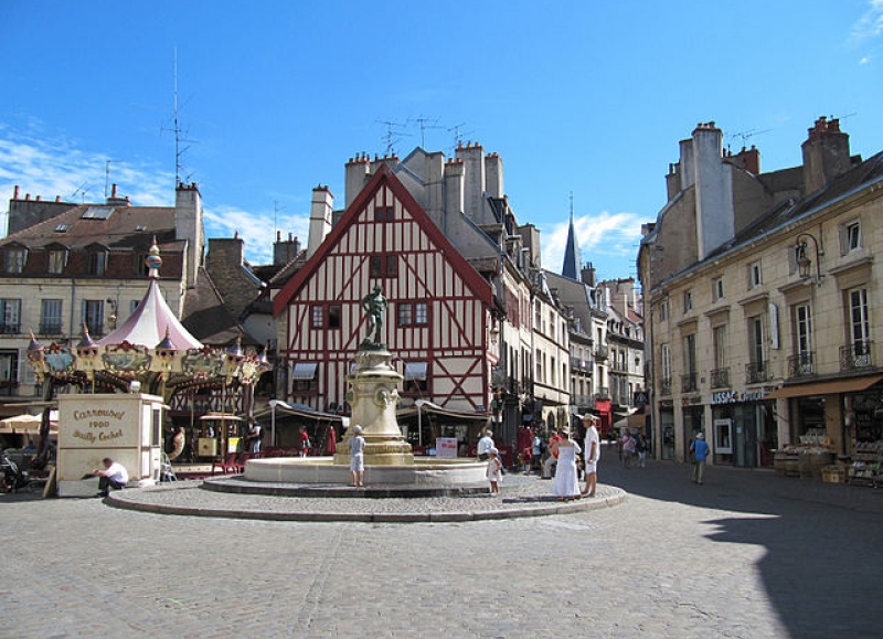 Beaune and its Hospices and colorful rooftops are part of most cycling tours