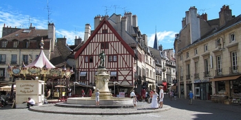 Beaune and its Hospices and colorful rooftops are part of most cycling tours