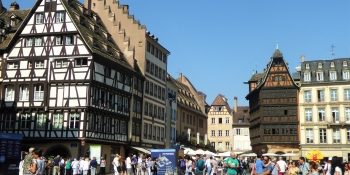 Admire the typical Alsatian architecture from your bike saddle