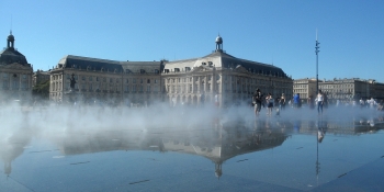 The city of Bordeaux and its famous miroir d'eau (water mirror) next to Place de la Bourse