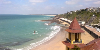 A view of the coast and the beach of Granville