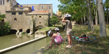 Relaxing cycling break along the river on the Carilet in Catalonia