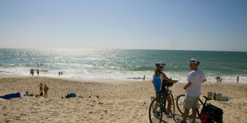 A break from cycling on the beach, Silver Coast, near Furadouro