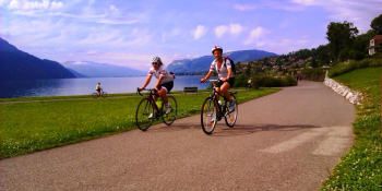 Riding by the lake du Bourget's shore on a traffic-free route next to Aix les Bains