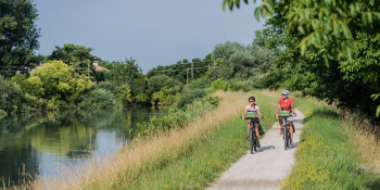 Bike path along the river in the Dolomites and the Veneto 