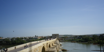 Puente Romano ancient Roman bridge in Cordoba, scenic stop on self-guided bike trips through Andalusia, Spain